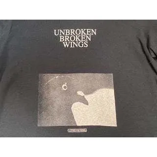 Undercover graphic top"Unbroken"